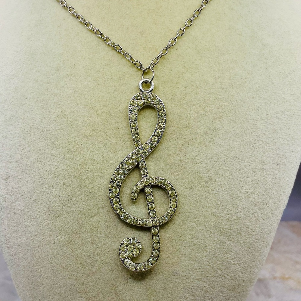 Rhinestone Silver Tone Treble Clef Music Sign Pendant Necklace. 24 inches
